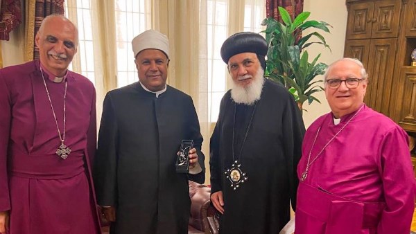 زيارة رئيس الأساقفة للأنبا بفنوتيوس تعزز المحبة والتعاون بين الكنائس